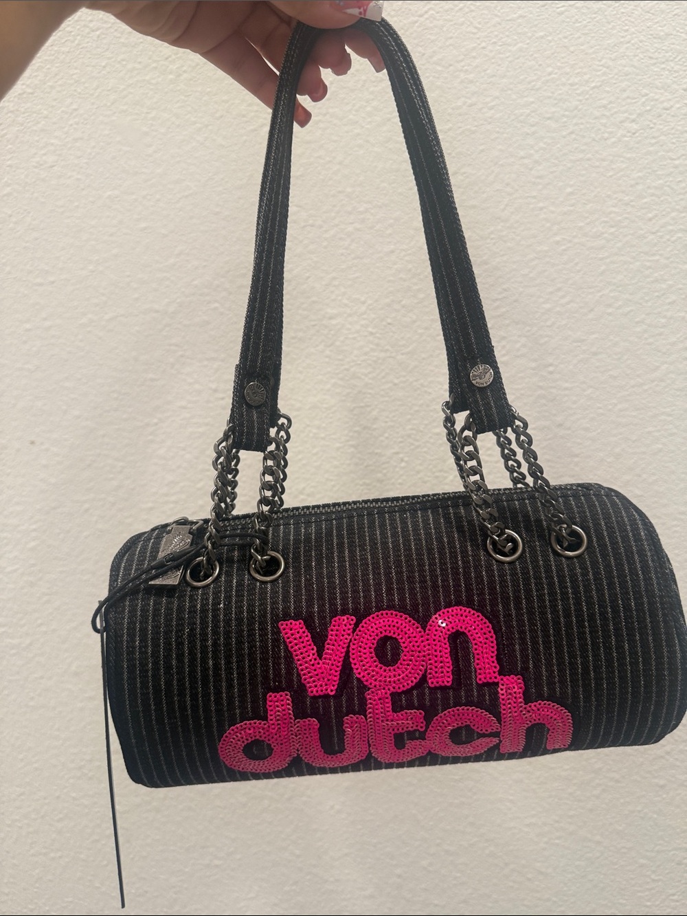 Von Dutch Black Pinstripe Barrel Bag with Hot Pink Logo